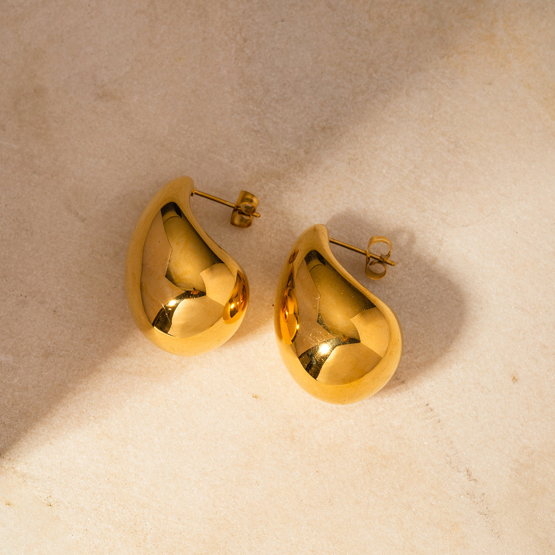 Glistening Teardrop Gold Hoops