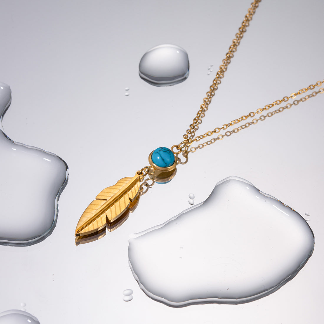 Aqua Feather Gold Necklace